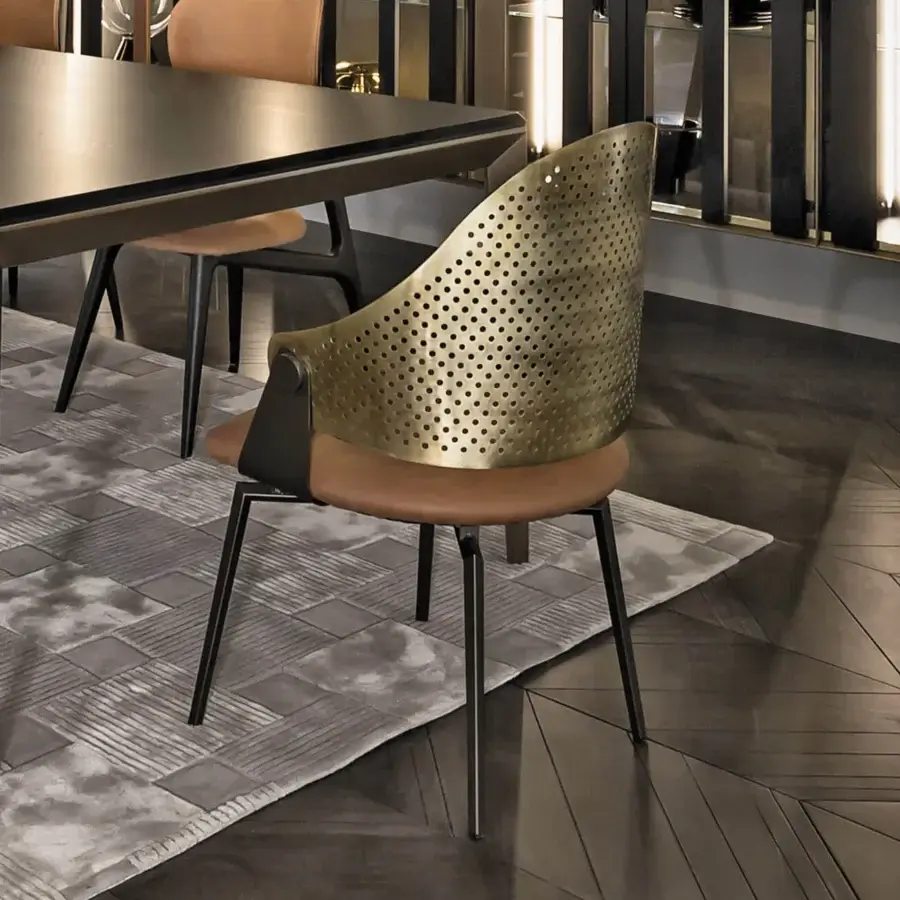 Exceptional Shake Roma armchair crafted with varnished steel, perforated burnished brass, and tan acrylic fiber upholstery