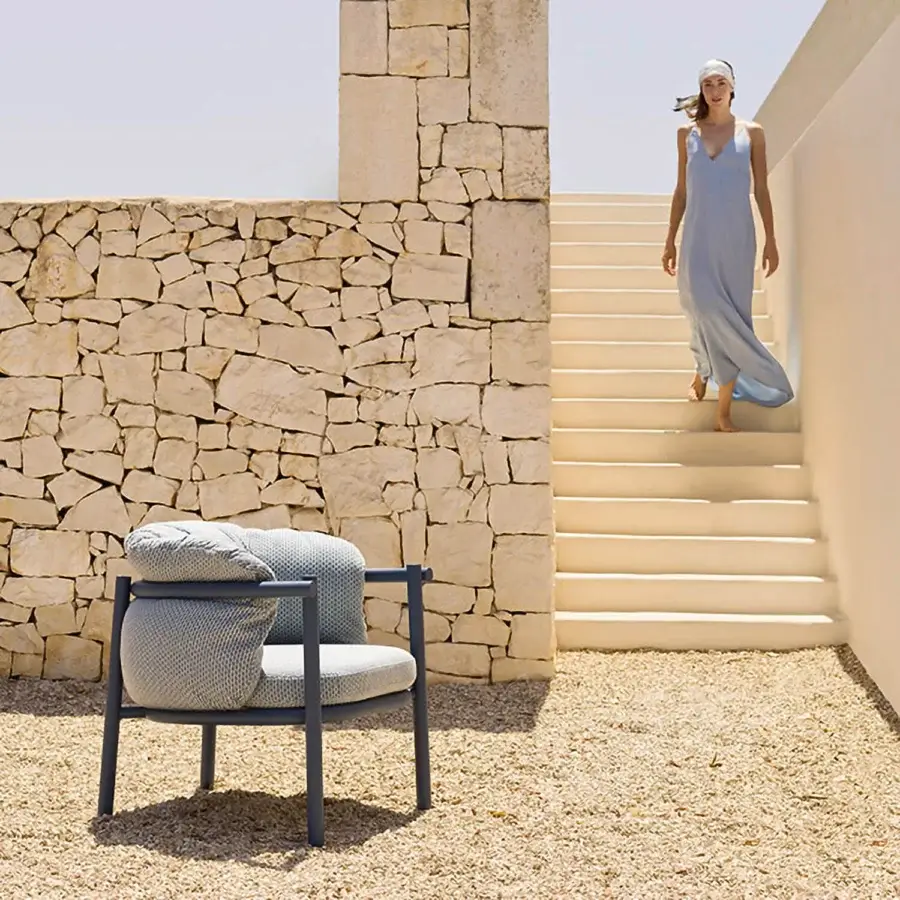 Sophisticated Varaschin Allegra lounge chair crafted with aluminum and textured blue-gray fabric for lasting outdoor use