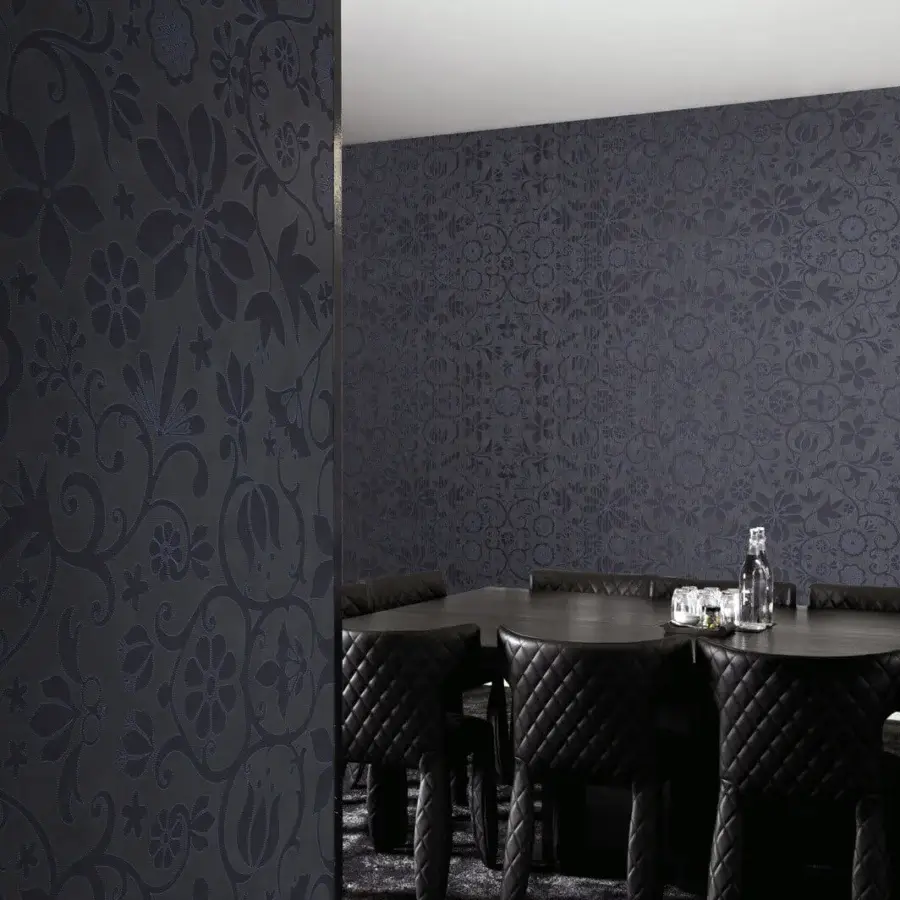 Distinguished LondonArt Amsterdam wallpaper showcases dense floral patterns in dark charcoal tones with a textured surface
