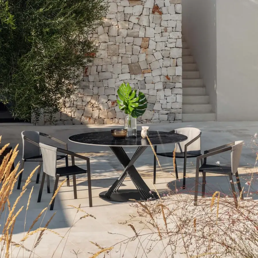 Superior MY YOUR Push table with a dark stoneware ceramic tabletop and polished glossy finish built with an X-shaped aluminum base