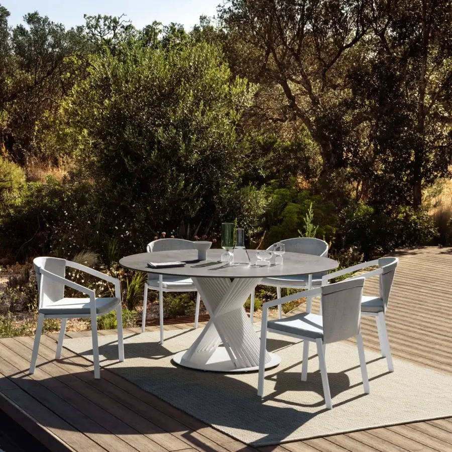 Superior MY YOUR Push table with swirling aluminum base and durable light gray HPL tabletop in smooth matte finish