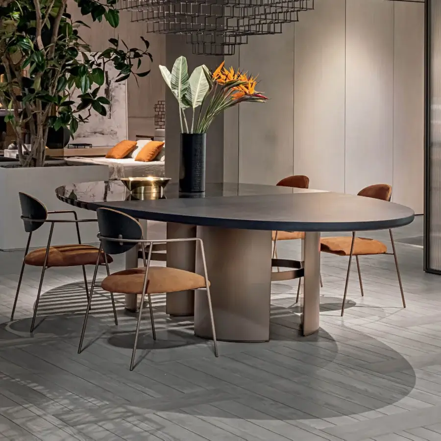 Distinguished Shake Tal table with a round dark charcoal top blending blockboard, solid ash wood, and polished-edge tempered glass with a varnished steel base
