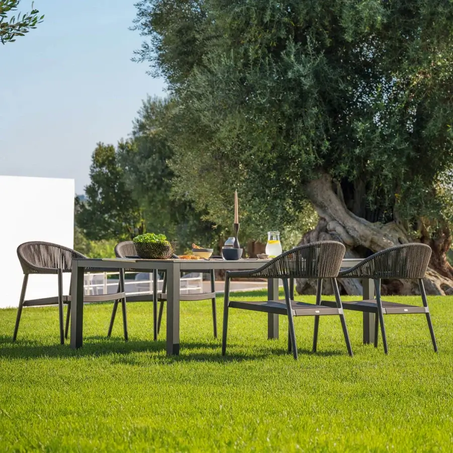 Superior Varaschin Victor low table with dark gray metal frame and matte woven synthetic tabletop for relaxed outdoor settings
