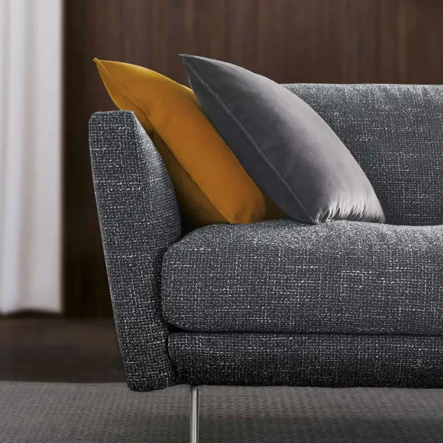 Elegant CTS Salotti Urban sofa upholstered in textured dark gray textile with sleek silver-toned aluminum legs and a golden yellow cushion