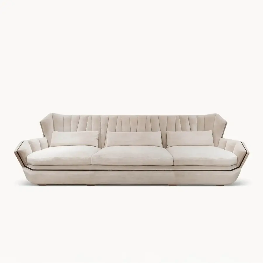 Distinguished Visionnaire Hemingway sofa with neutral beige plush velvet upholstery, curved lines and decorative zipper detail
