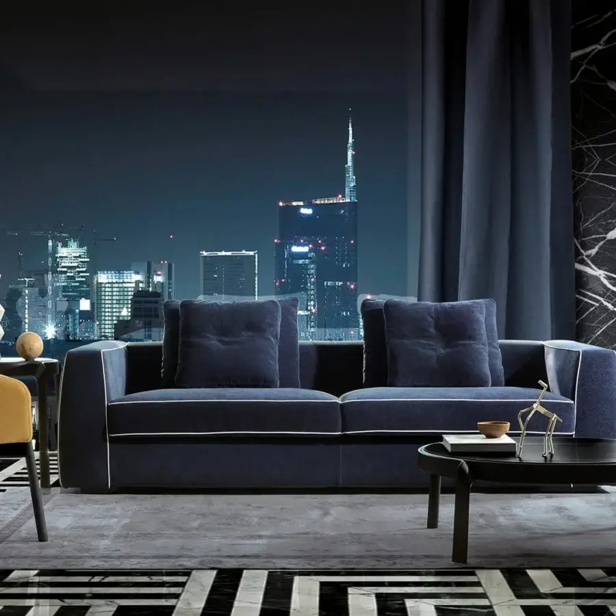 Distinguished CTS Salotti Clay sofa with deep navy textile upholstery, contrasting piping and stained beech base