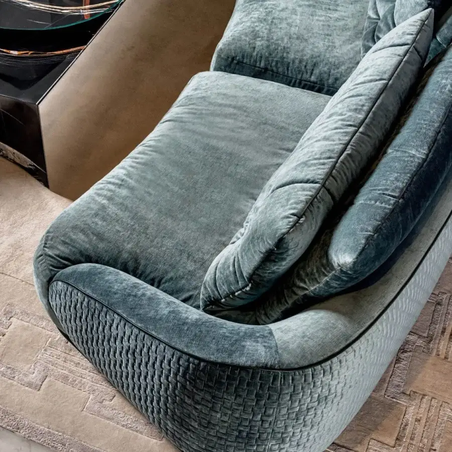 Distinguished Visionnaire Holden sofa with subtly textured dusty blue-grey textile, goose down quilt and matte wooden feet