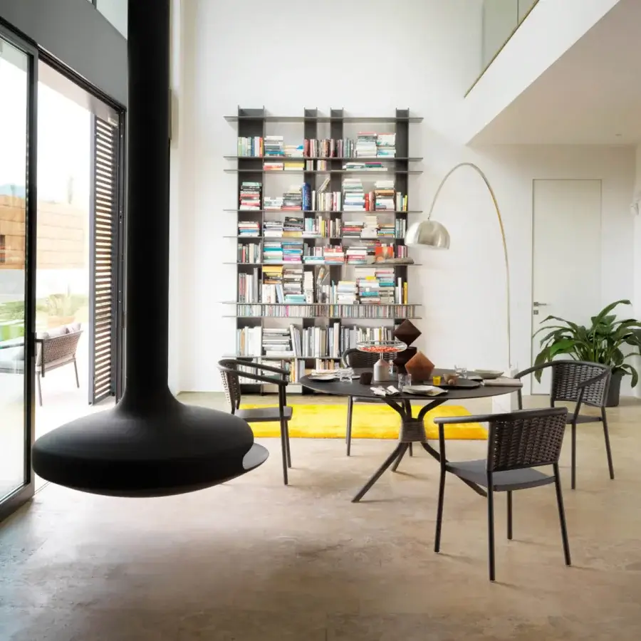 Superior Roberti Rattan Capri table with round HPL top, powder-coated steel base and decorative searope detailing