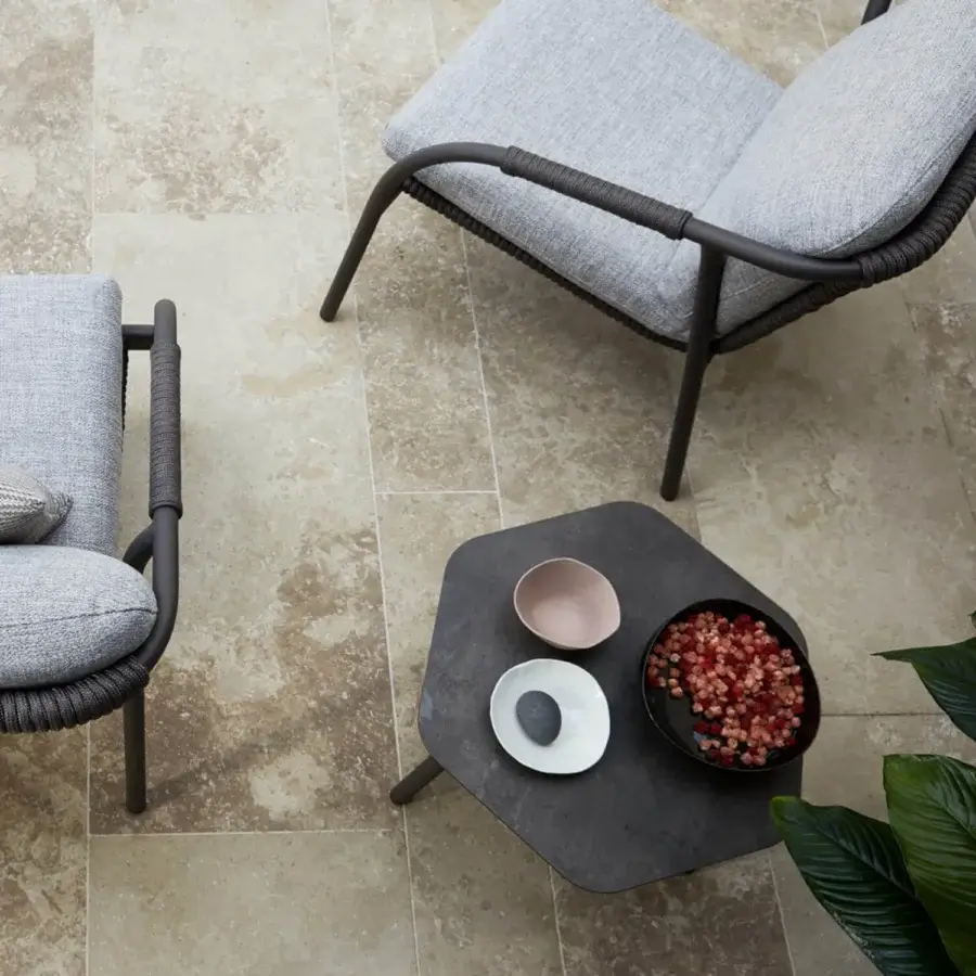 Superior Roberti Rattan Capri table with hexagonal HPL surface and dark charcoal gray powder-coated aluminum base