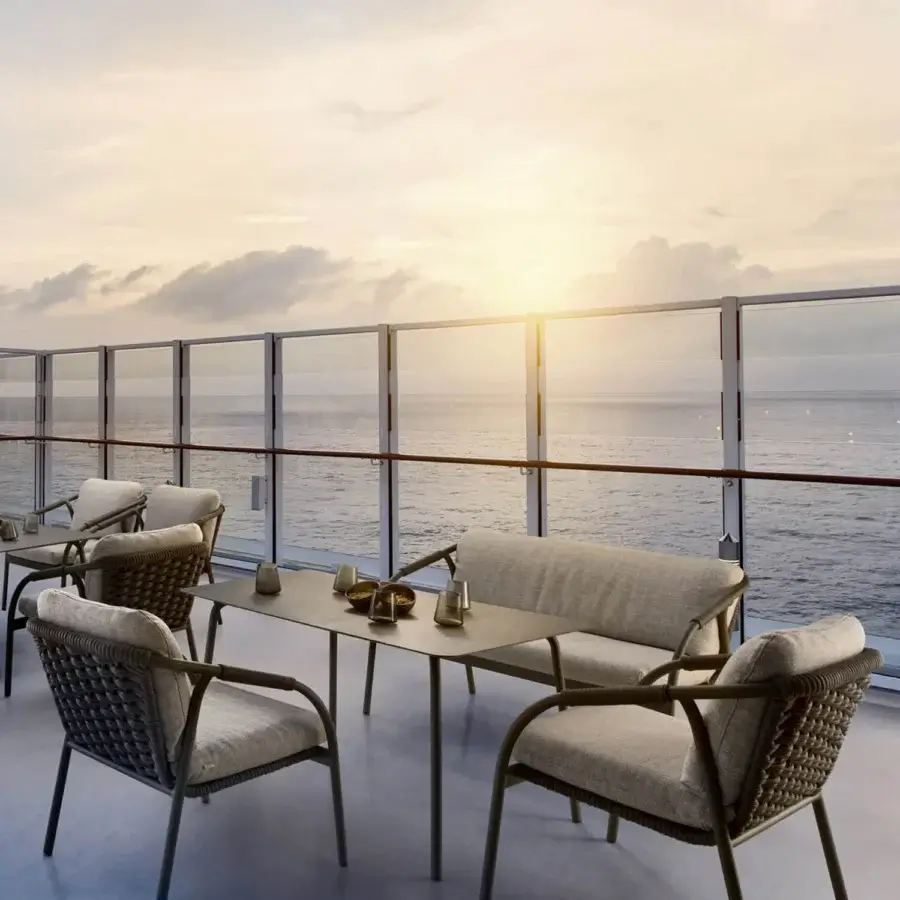 Elegant Roberti Rattan Capri lounge chair with olive-green searope woven around a powder-coated aluminum frame and light beige upholstery
