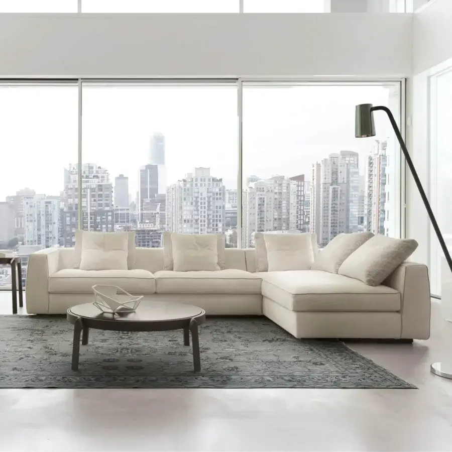Exceptional CTS Salotti Clay sectional upholstered in light neutral beige textile with a subtly textured finish