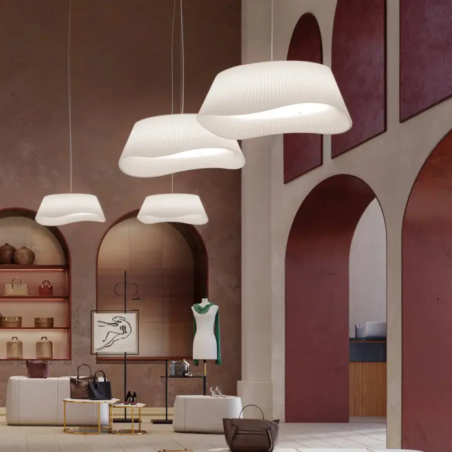 Distinguished Modo Luce Cocò Demi suspension lamp with a broad curved silhouette and warm white pleated fabric with an opal plex diffuser finish