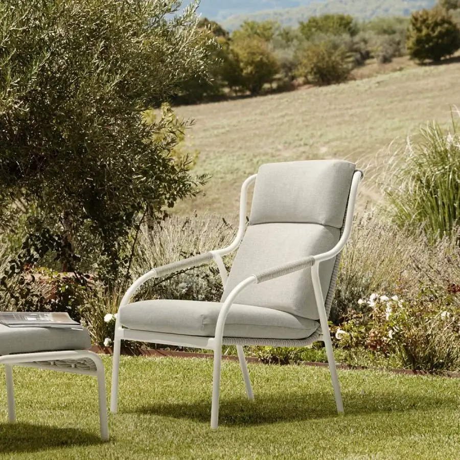Distinguished Roberti Rattan Capri relax lounge chair with pale beige textile and powder-coated aluminum frame built with durable searope