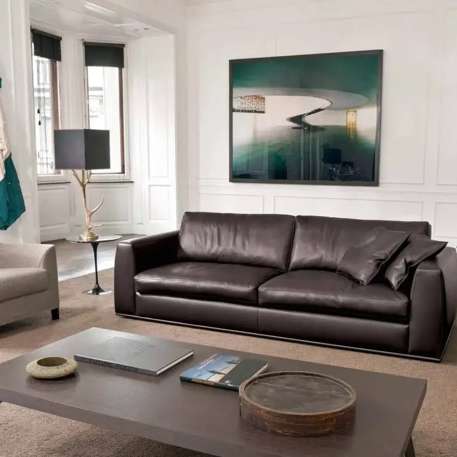 Sophisticated CTS Salotti Andy sofa in dark brown leather with a sleek tubular aluminium base and generously filled cushions