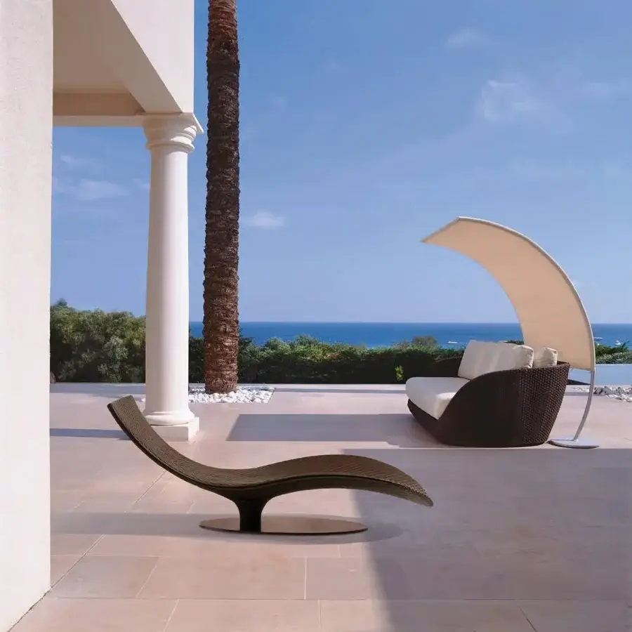 Superior Roberti Rattan Caribe lounger with durable aluminum frame, chocolate Sunloom weaving and removable polyurethane mattress