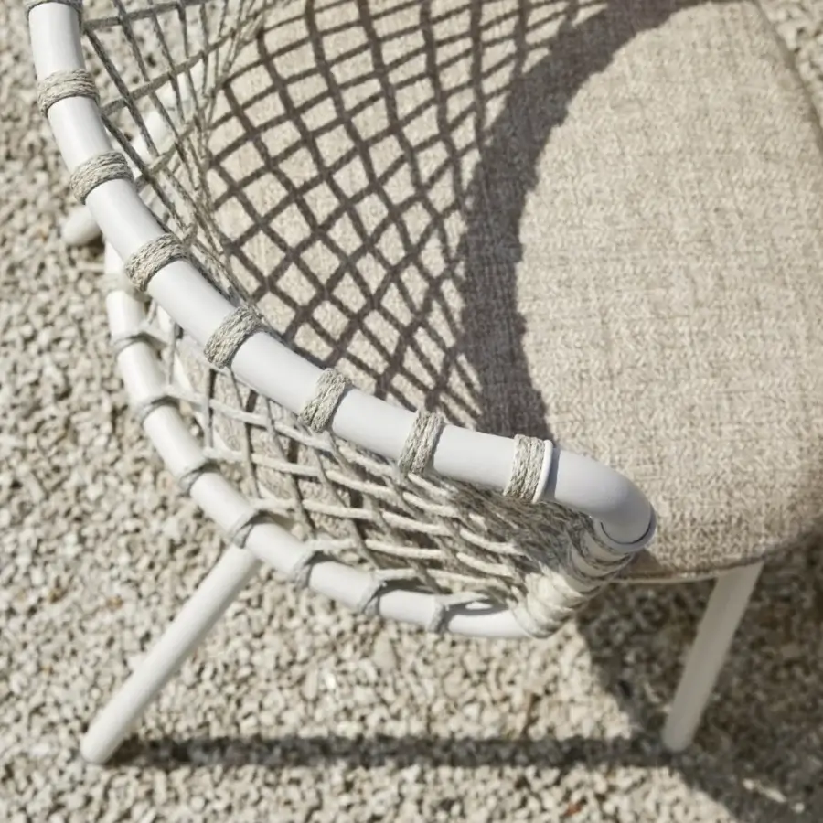 Sophisticated Roberti Rattan Charme armchair with woven Flat Trendyrope and a powder-coated 304 steel frame