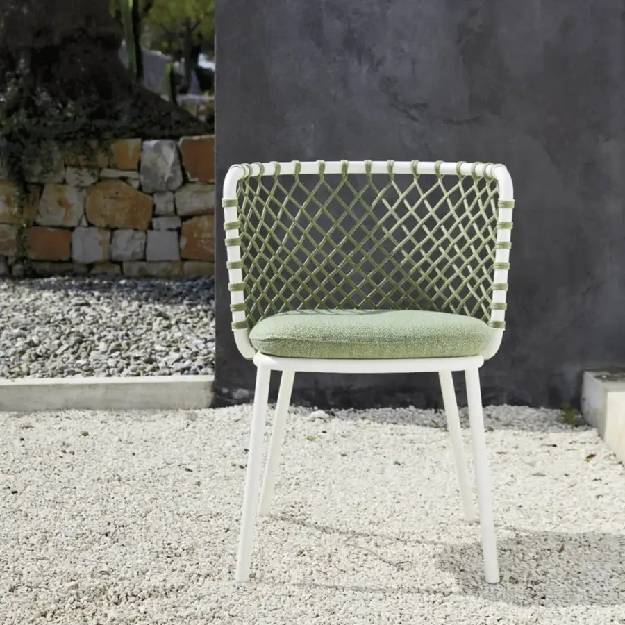 Lavish Roberti Rattan Charme armchair crafted with muted olive-green Flat Trendyrope and powder-coated 304 steel frame