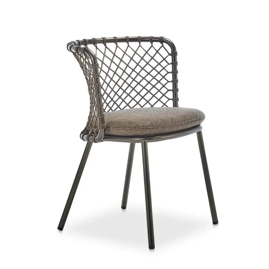Sophisticated Roberti Rattan Charme armchair with woven Flat Trendyrope and muted bronze powder-coated steel frame