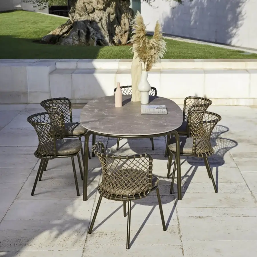 Sophisticated Roberti Rattan Charme table with grey HPL top and dark green powder-coated steel frame crafted in Italy