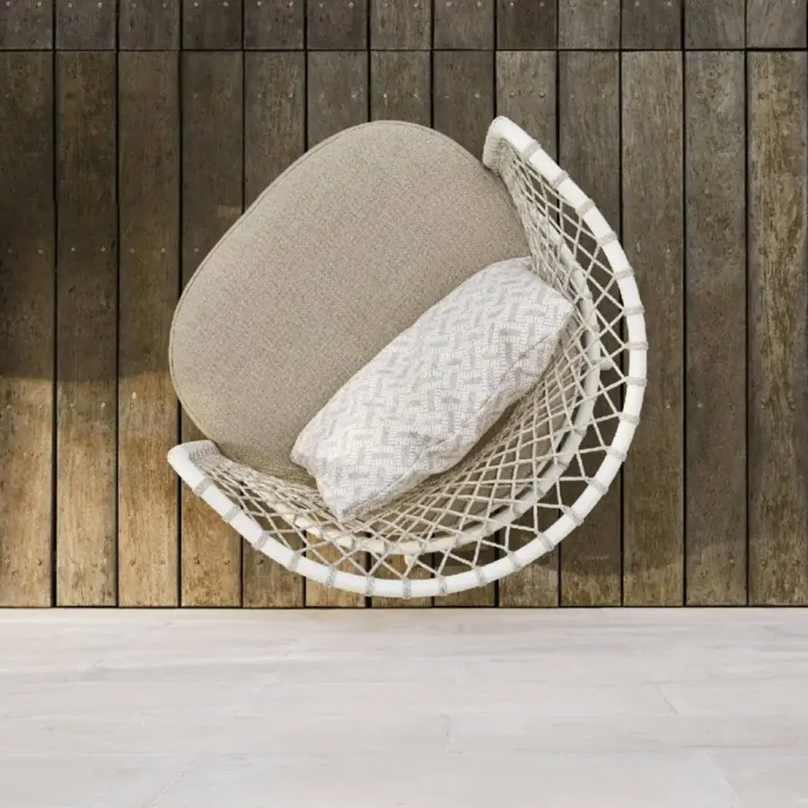 Distinctive Roberti Rattan Charme lounge chair crafted with powder-coated 304 steel and Flat Trendyrope in neutral tones
