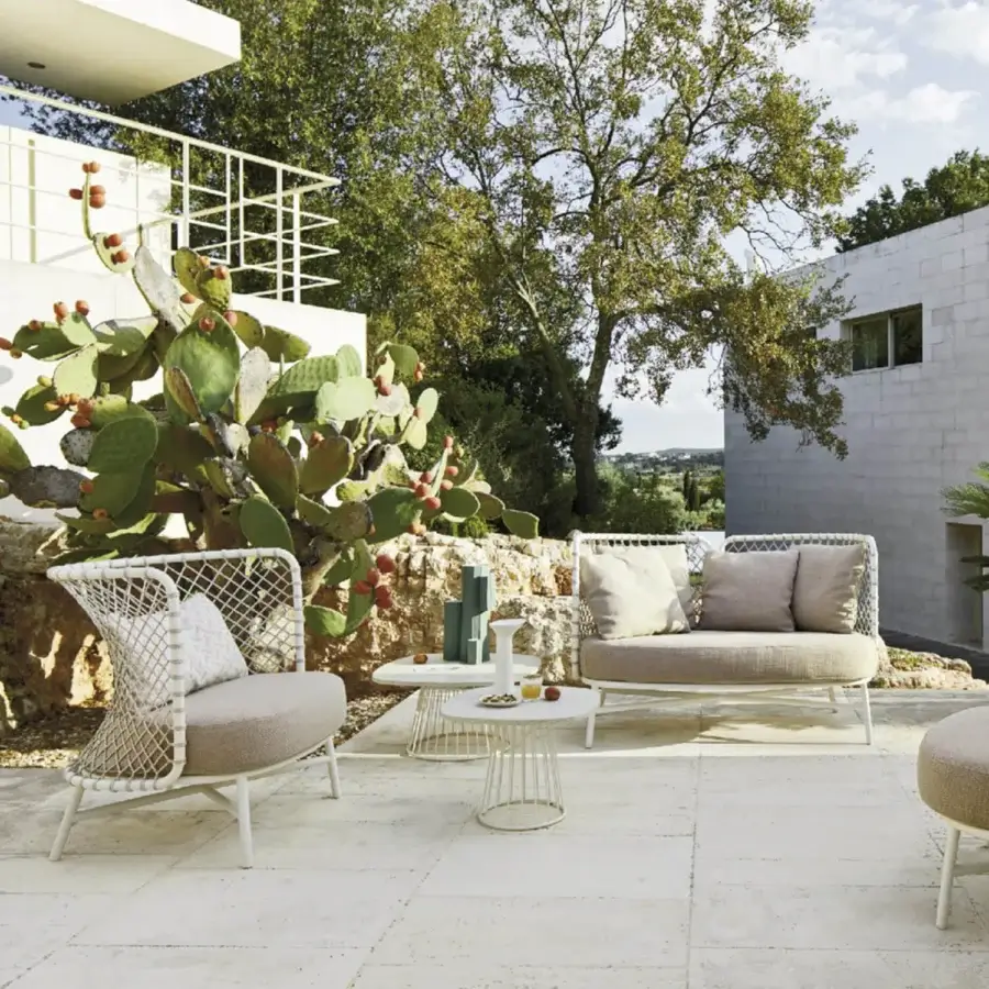 Exceptional Roberti Rattan Charme lounge chair with woven Flat Trendyrope and neutral beige upholstery in matte white finish