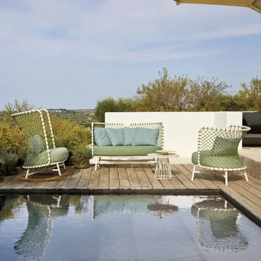 Superior Roberti Rattan Charme lounge chair crafted with powder-coated 304 steel and woven Flat Trendyrope in muted green