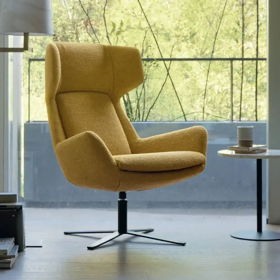 Superior CTS Salotti Grace lounge chair in golden yellow textured woven fabric with a sleek black steel swivel base