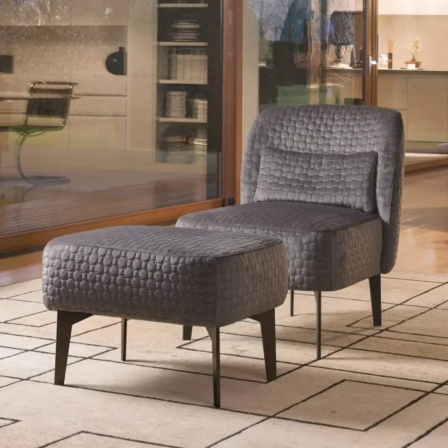 Distinctive CTS Salotti Margot lounge chair upholstered in textured muted gray textile with dark-stained wooden legs