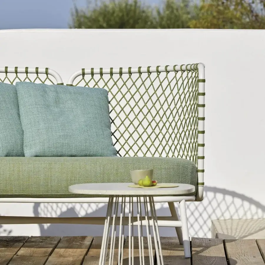 Exceptional Roberti Rattan Charme sofa crafted with white powder-coated steel and woven Flat Trendyrope with light green and muted blue cushions