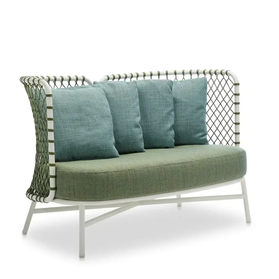 Superior Roberti Rattan Charme sofa crafted with white powder-coated steel and woven Flat Trendyrope with muted green and cool blue cushions