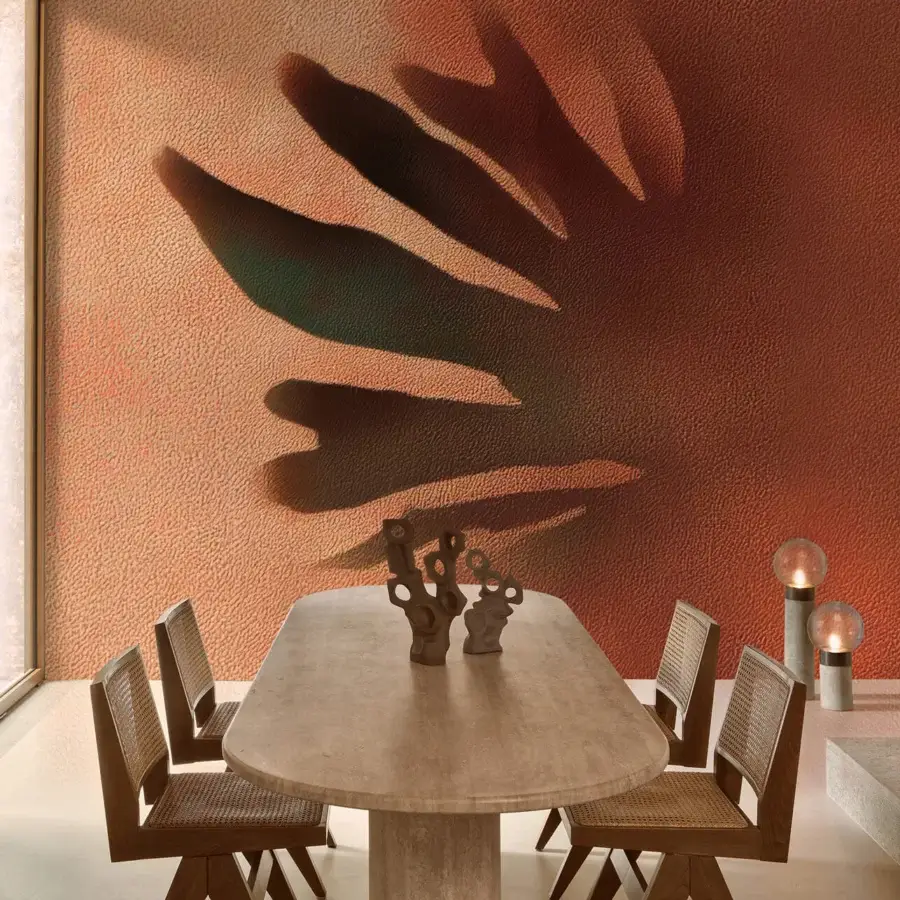Superior Wall&Decò Eclisse wallpaper in warm terracotta tone with subtle leaf silhouettes and a textured d.TW finish