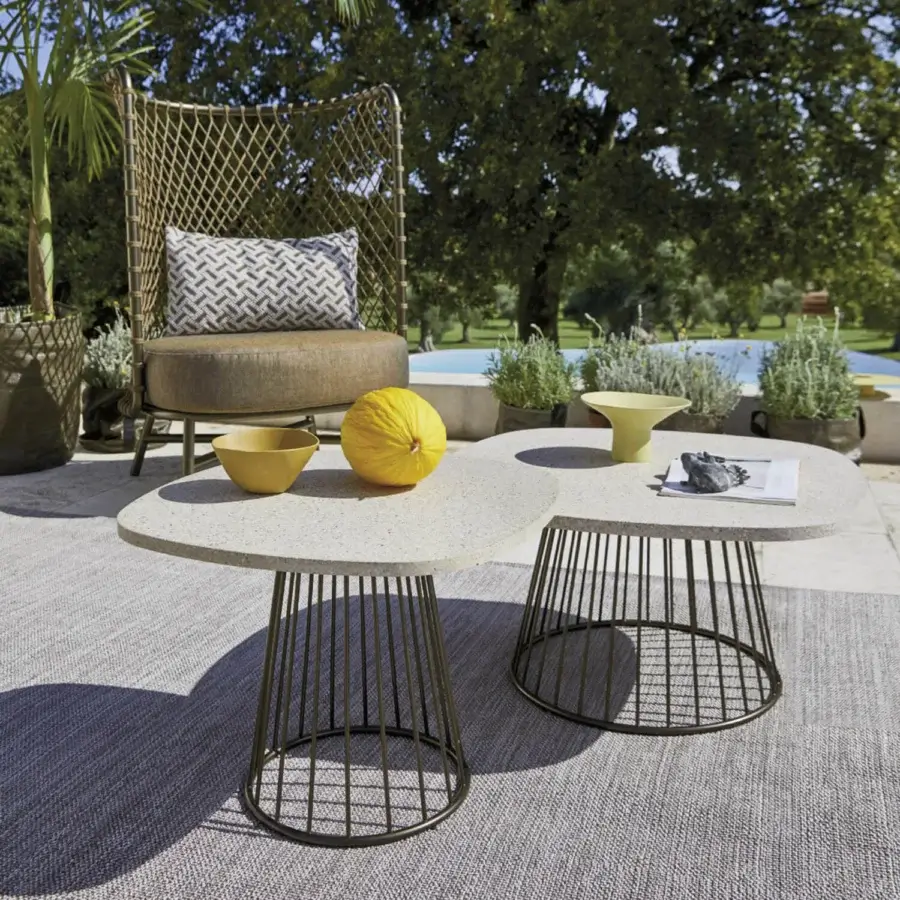 Elegant Roberti Rattan Charme side table with terrazzo top and mother-of-pearl inserts, built with a powder-coated steel base