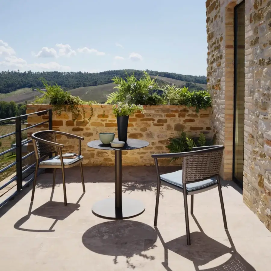 Distinctive Roberti Rattan Lipari armchair with dark grey-brown powder-coated aluminum and woven Oval Seaprope detailing