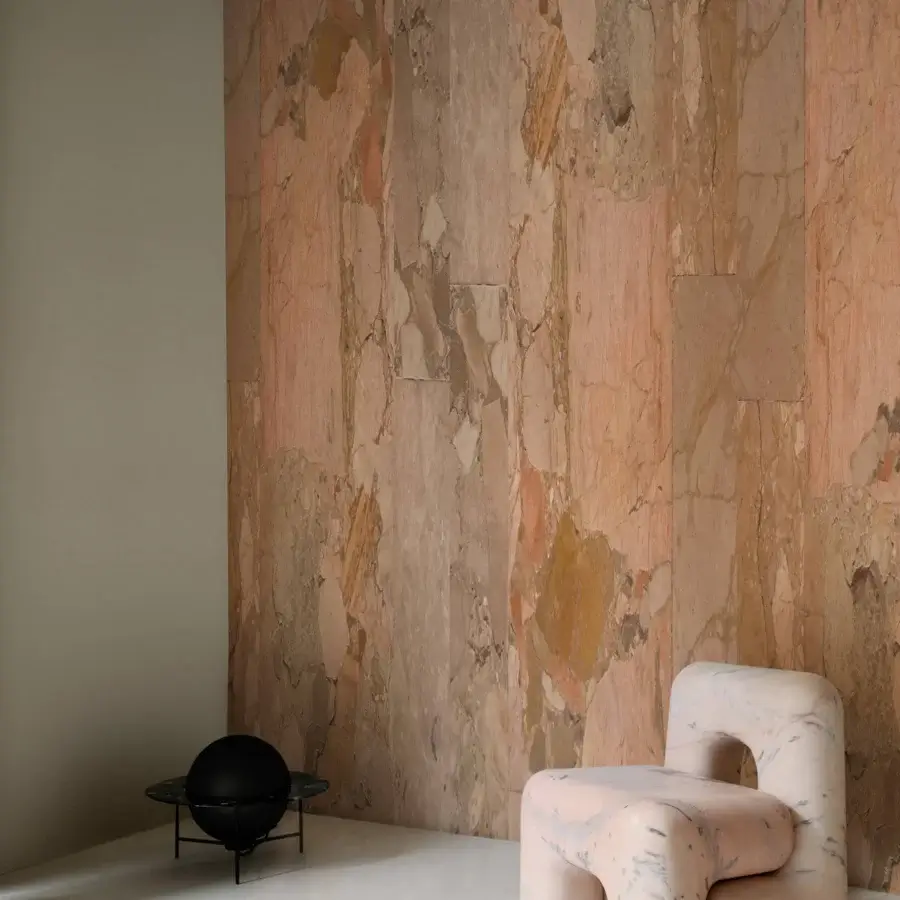 Elegant Wall&Decò Beige Allure wallpaper with a stone effect and layered textures in beige, pink, gray, and brown tones with a fabric-effect finish