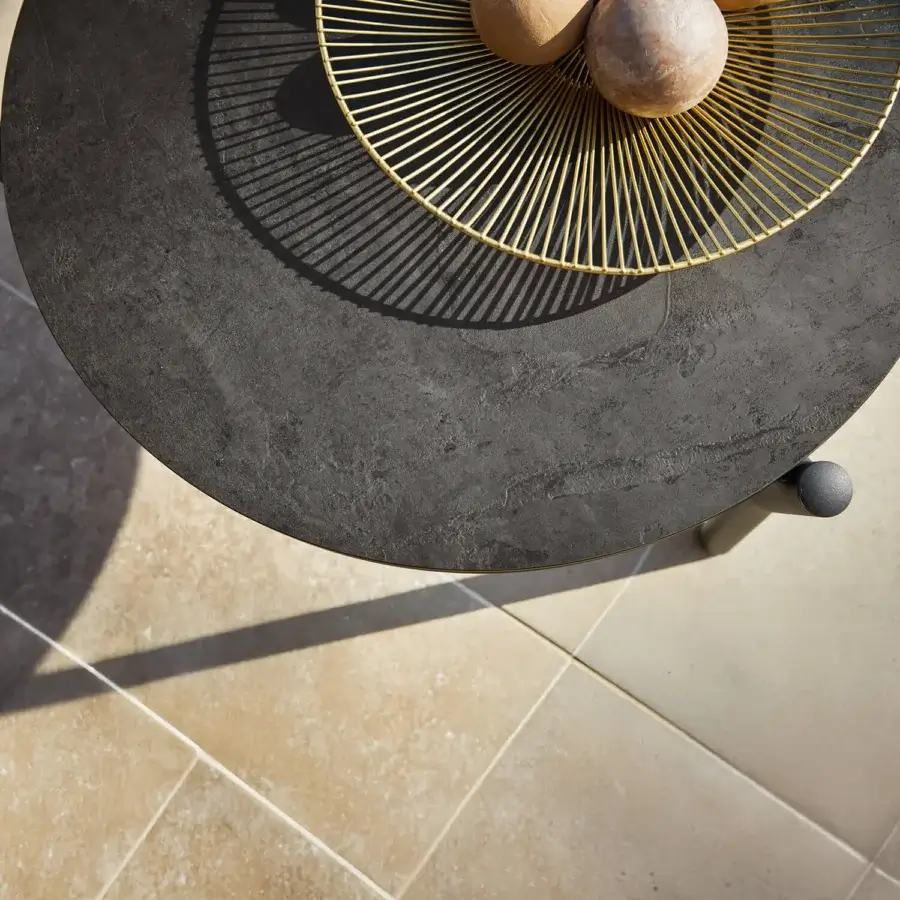 Exclusive Roberti Rattan Lipari side table with dark charcoal HPL top and golden powder-coated aluminum base crafted in Italy
