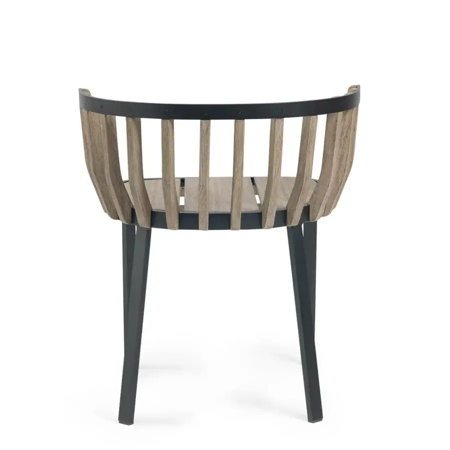 Harmonious Ethimo Swing armchair crafted with a dark metal frame and precisely arranged teak slats with a sophisticated matte finish