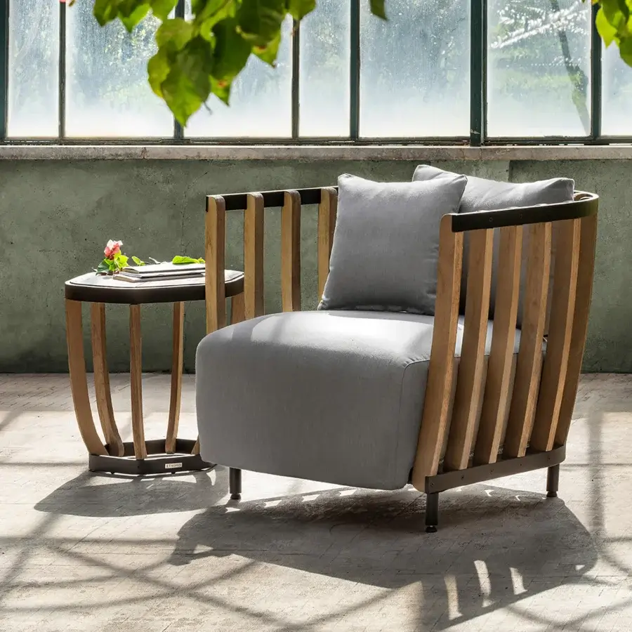 Superior Ethimo Swing side table with a satin finish, crafted in brown teak slats and a metal frame