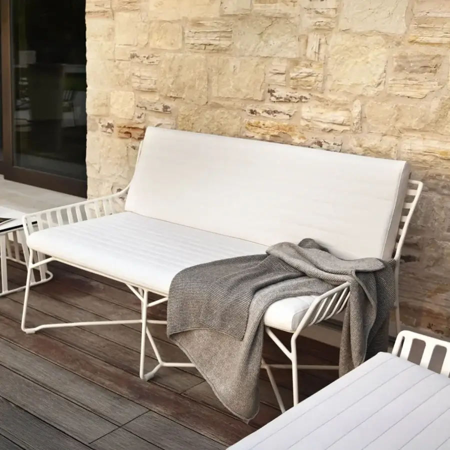 Superior Roberti Rattan Hamptons Graphics sofa with white cushions and durable powder-treated aluminum frame crafted in Italy