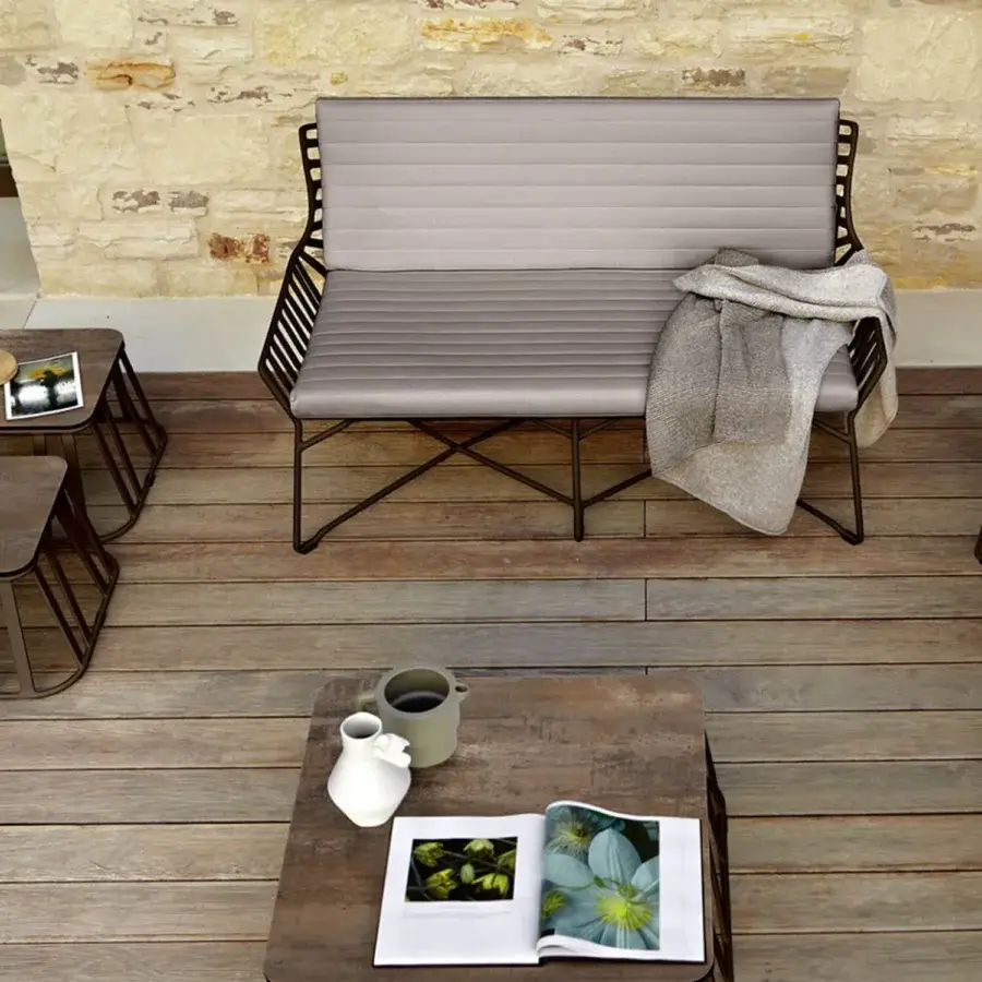 Distinguished Roberti Rattan Hamptons Graphics sofa with neutral gray textile and durable powder-treated aluminum frame