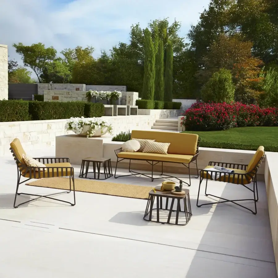 Exceptional Roberti Rattan Hamptons Graphics sofa crafted with aluminum frame and powder-treated finish in warm yellow with patterned accents