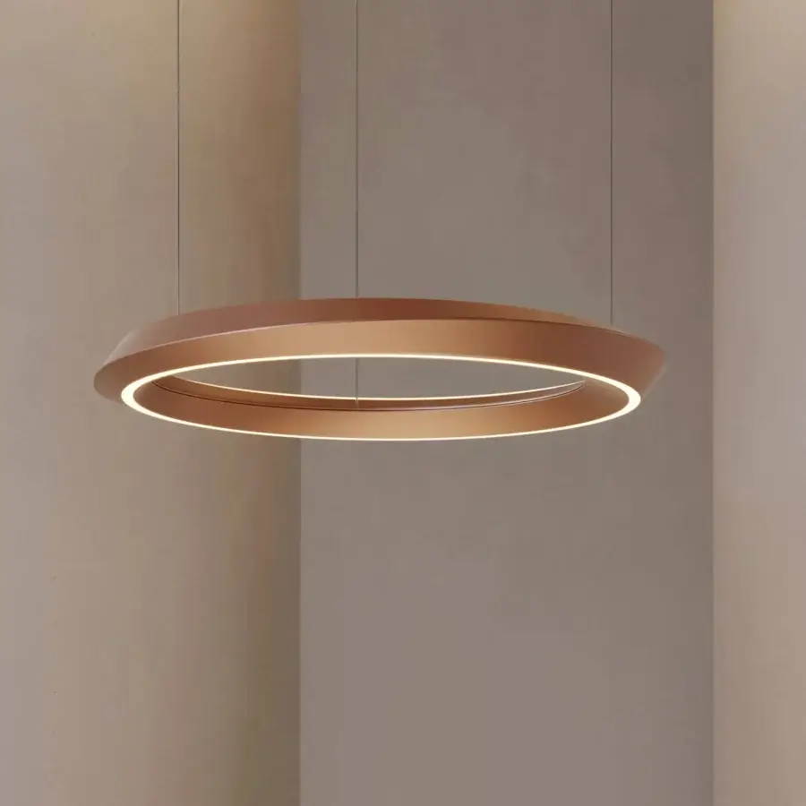 Distinguished Lodes Tidal suspension lamp crafted in metal with a brushed coppery finish embodying a contemporary balanced form