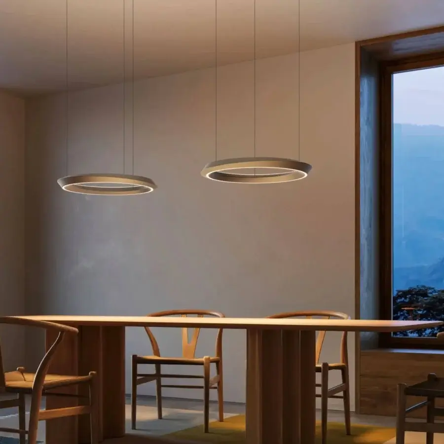 Elegant Lodes Tidal suspension lamp crafted in metal with warm muted gold satin finish and asymmetrical rings