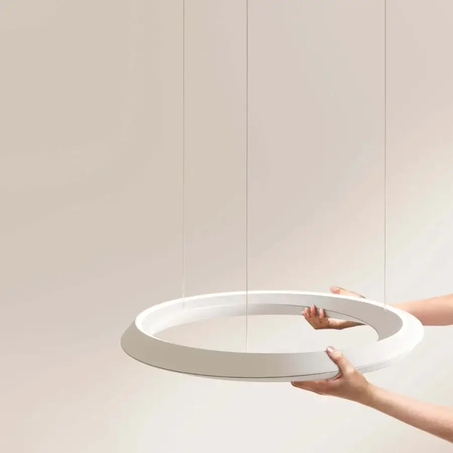 Superior Lodes Tidal suspension lamp crafted in matte white with asymmetrical rings for balanced illumination