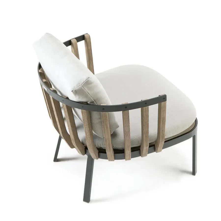 Harmonious Ethimo Swing lounge chair with a dark metal frame and precisely arranged teak slats, plus a light textile cushion