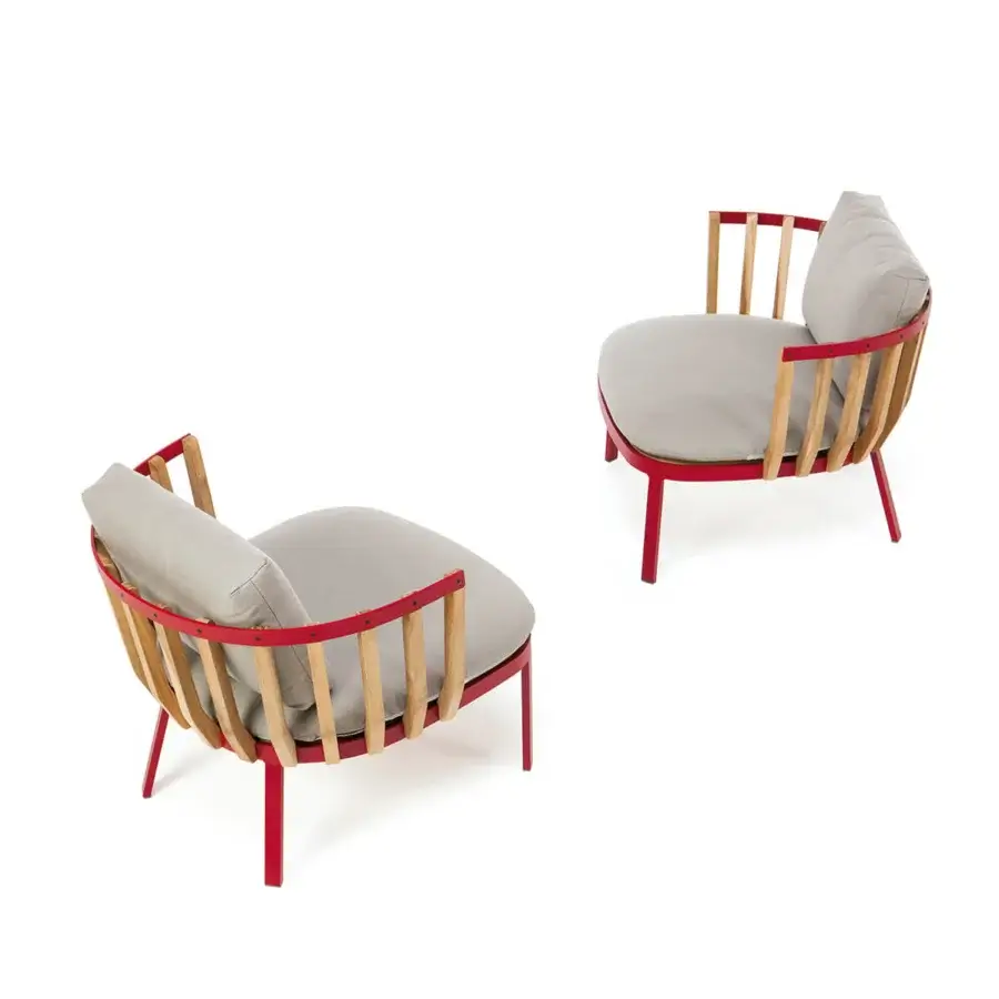 Innovative Ethimo Swing lounge chair with architectural metal, light gray cushions and teak slats, boasting a smooth matte finish