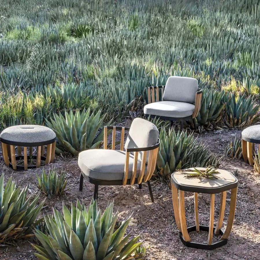 Exceptional Ethimo Swing lounge chair with neutral gray textile cushioning and precisely arranged teak slats crafted in Italy