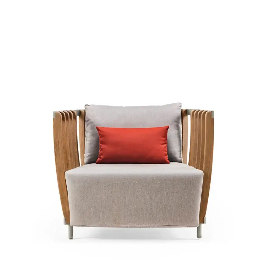 Elegant Ethimo Swing lounge chair crafted with a metal frame, warm teak slats and neutral gray textile with reddish-orange cushion