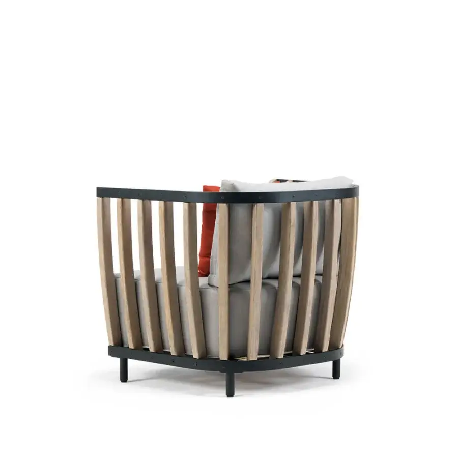Sophisticated Ethimo Swing lounge chair with dark metal, warm teak slats and vibrant orange light gray cushions