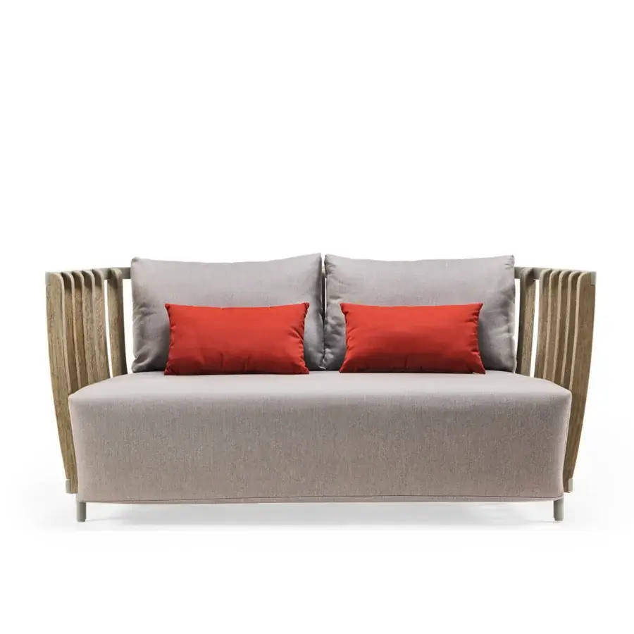 Superior Ethimo Swing sofa with architectural metal, teak slats, neutral gray textile upholstery and reddish-orange cushions
