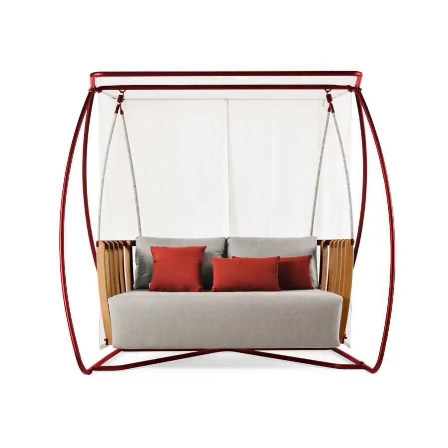 Elegant Ethimo Swing hanging sofa with a red matte metal frame supporting rhythmic teak slats and light gray textile upholstery